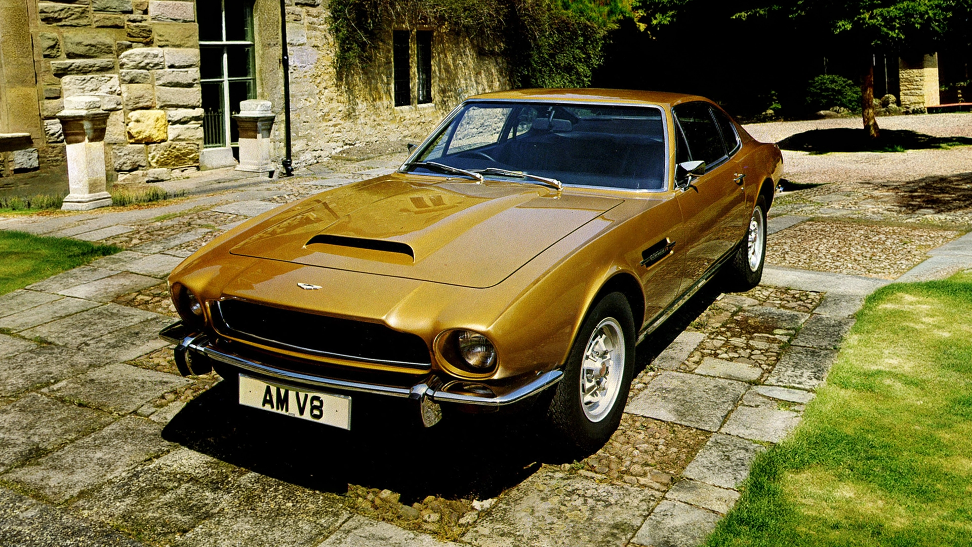 1975-aston-martin-v8-gold-front-qtr-car-back-catalogue